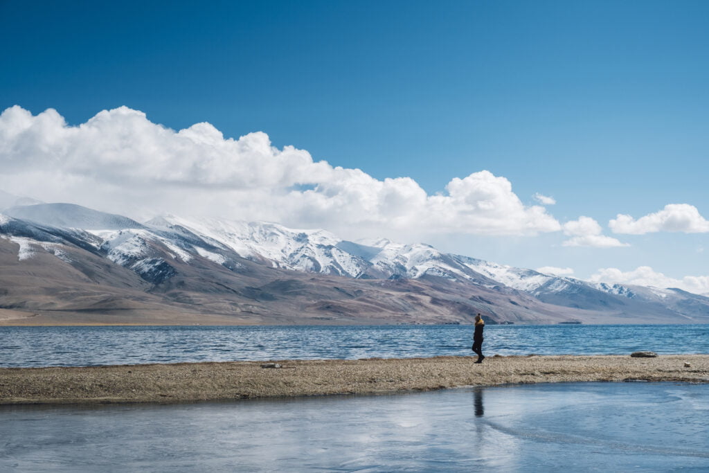 women at Pangong lake and mountain in Leh Ladakh, India